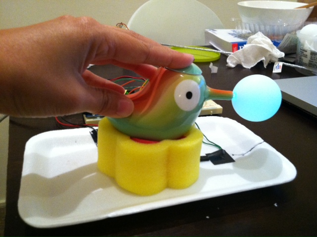 Bird w/ lighted up ping pong ball